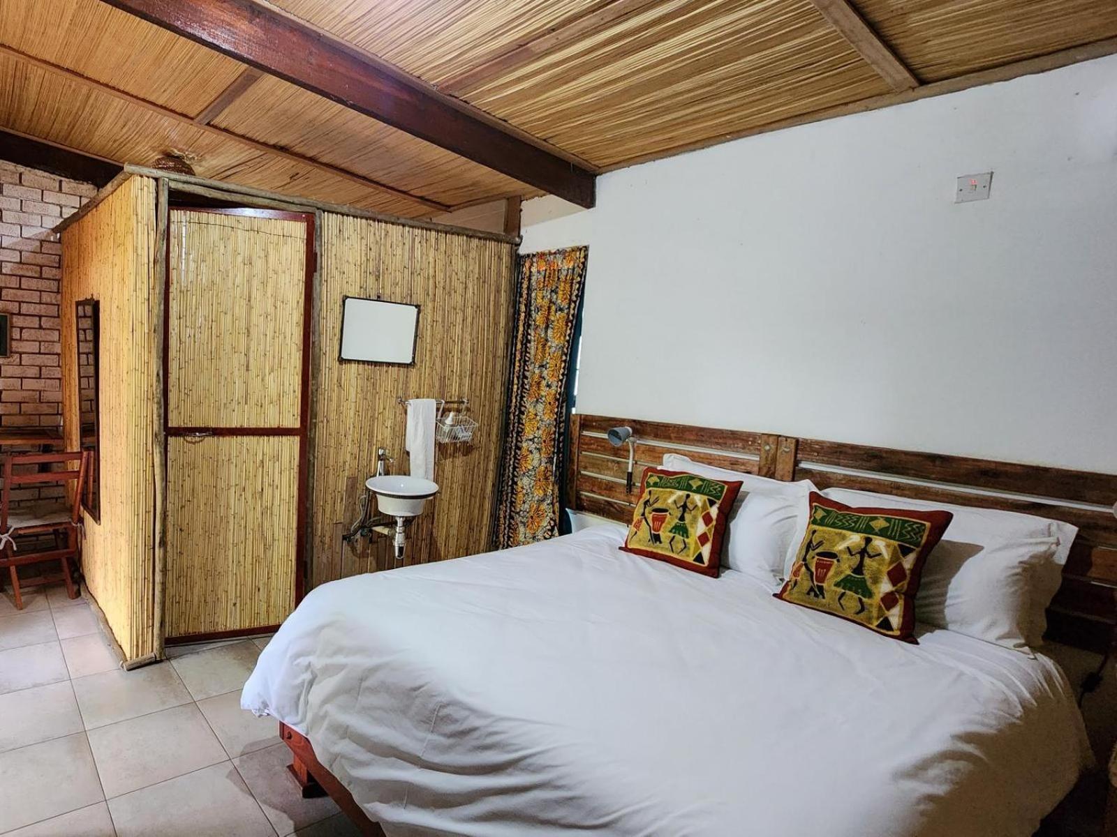 Nxabii Cottages Kasane Quarto foto